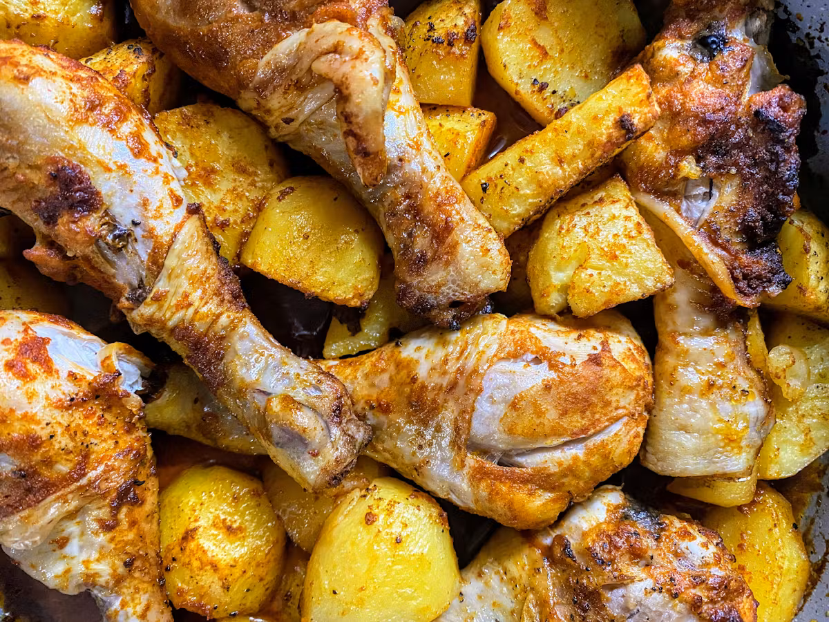 pot of cooked chicken and potatoes